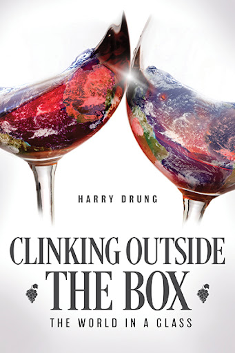 Cover of a book with two  wine glasses with red wine touching. Text says Harry Drung, Clinking Outside the Box, The World in a Glass.